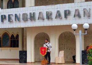 Ketua DPR Papua, Denny Henrry Bonai memberikan sambutan pada momen perayaan HUT Pekabaran Injil 170 tahun dan peletakan batu pertama Gereja GKI Pengharapan 