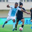 Pemain PSBS Biak berduel dengan pemain Borneo FC 