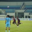 Pemain Persipura melakukan selebrasi 