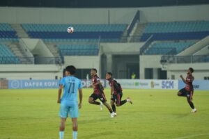 Pemain Persipura melakukan selebrasi 