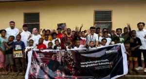 Indosat Berbagi Kasih dan menyerahkan donasi di Panti Asuhan Pembawa Terang Jayapura